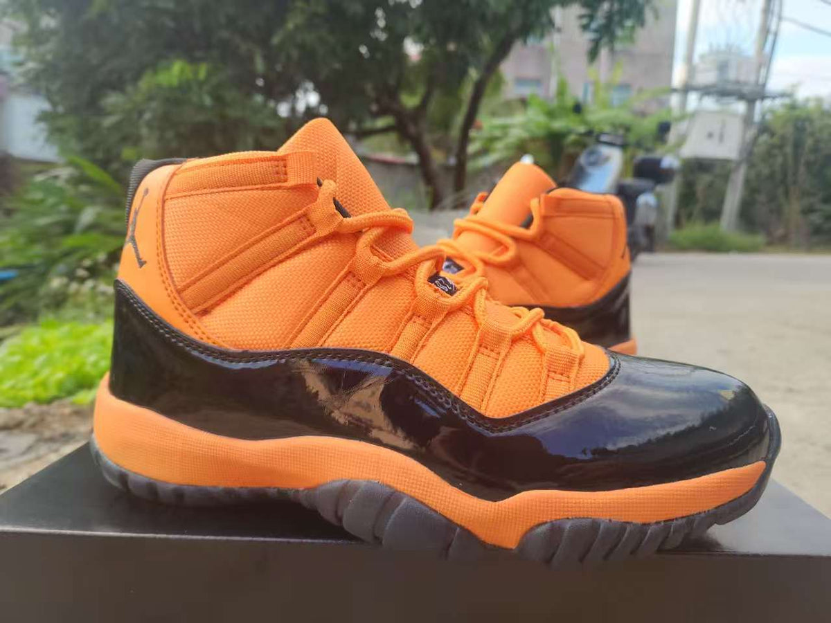 Air Jordan 11 Retro “Black Orange”